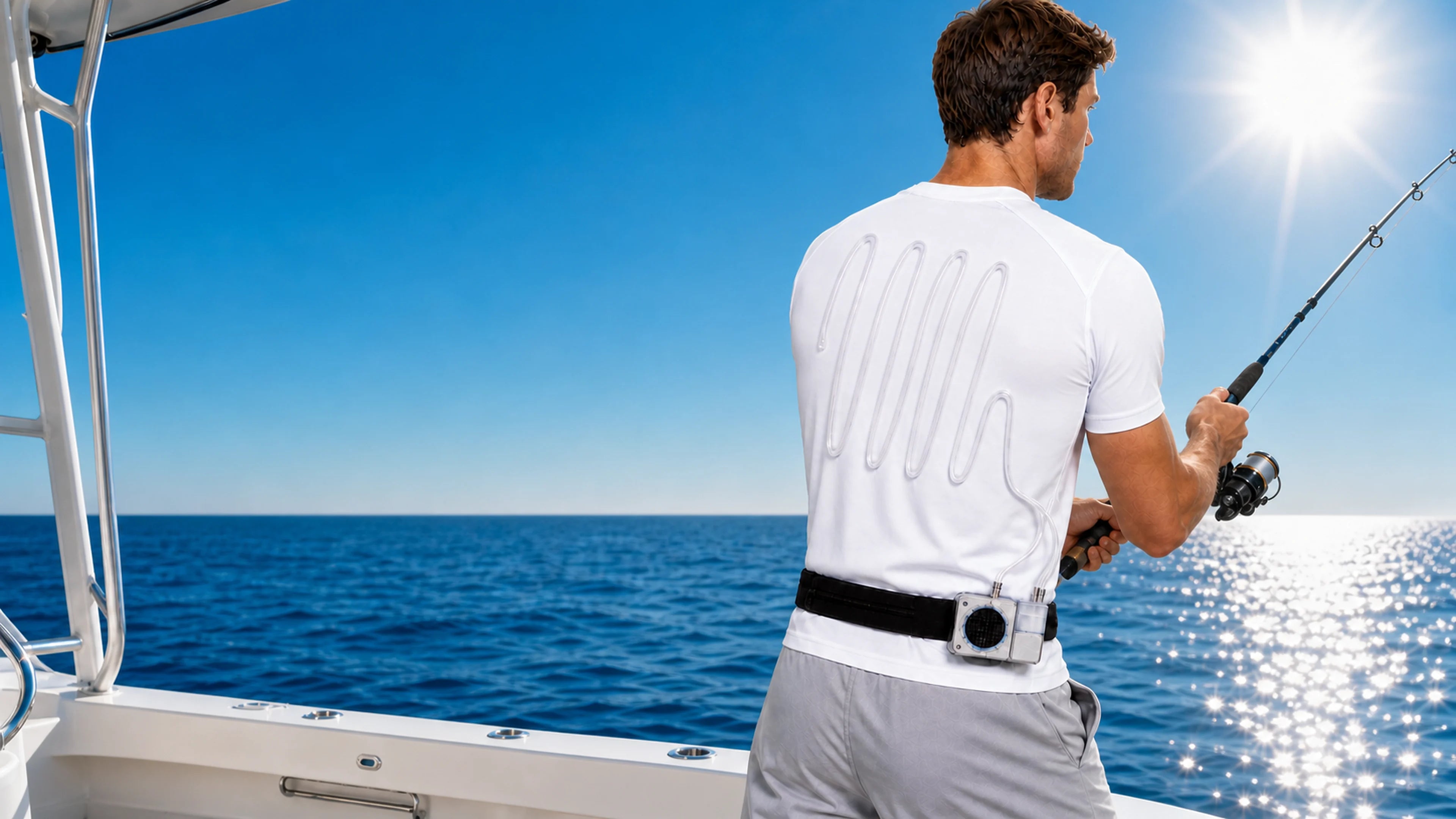 Angler wearing a FROSTSKIN short-sleeve liquid-cooling shirt on a yacht at midday